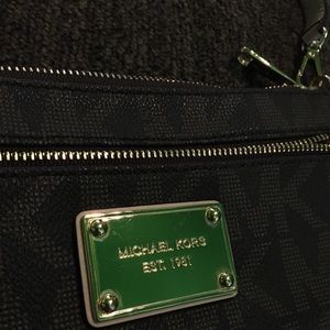Michael Kors monogram wristlet wallet